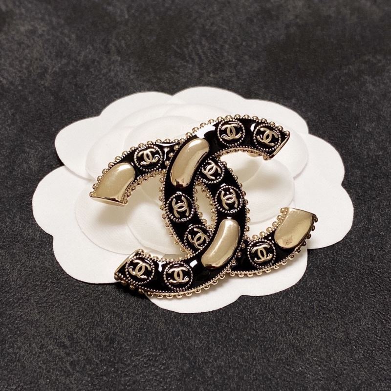 Ch**el brooches